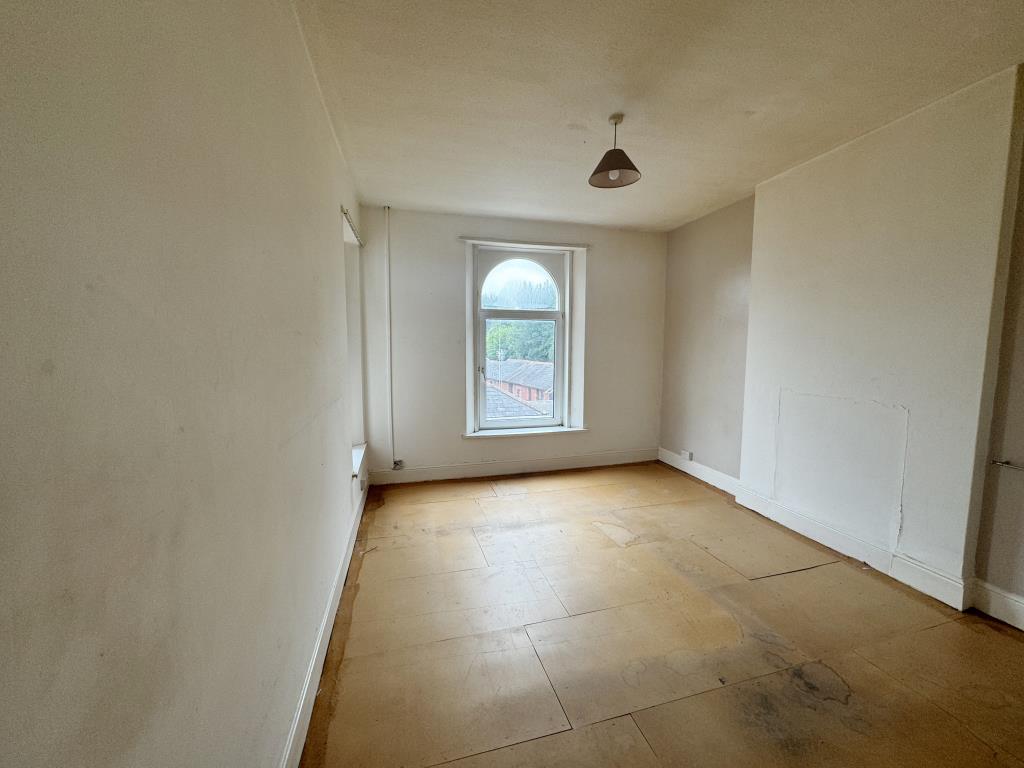 Lot: 30 - MIXED USE PROPERTY FOR INVESTMENT OR OCCUPATION - View of bedroom one on the first floor